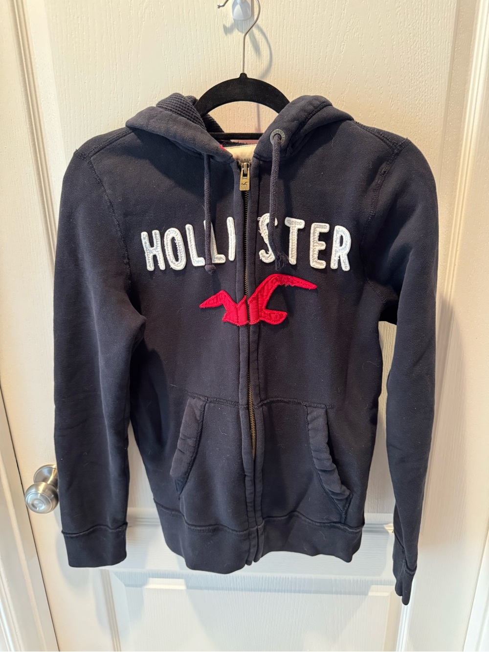 Hollister Navy Zip-Up Hoodie with Red Logo